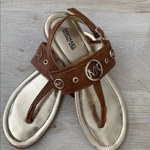 2 pair of Sandals one is Michael Kors